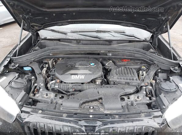 WBXHT3C30GP883734 2016 BMW X1 Black Vista trasera