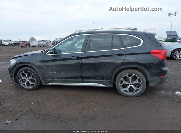 WBXHT3C30GP883734 2016 BMW X1 Black Vista interior de 360 grados