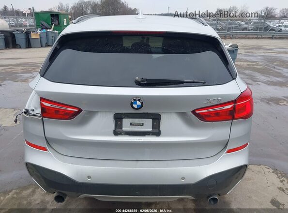 WBXHT3C31G5E51359 2016 BMW X1 Серебряный 