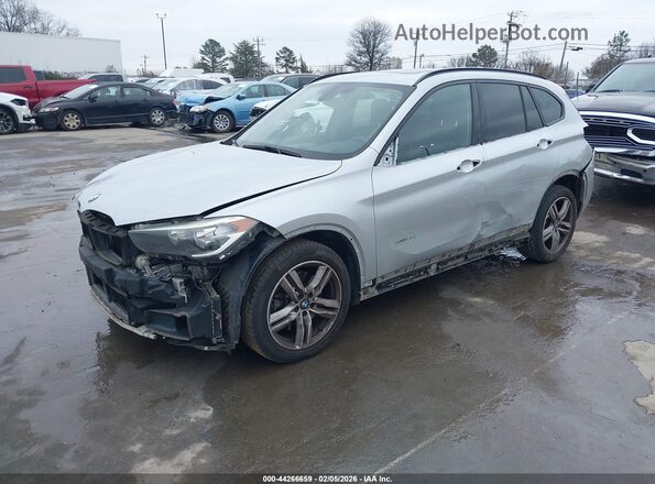 WBXHT3C31G5E51359 2016 BMW X1 Серебряный Передняя левая четверть