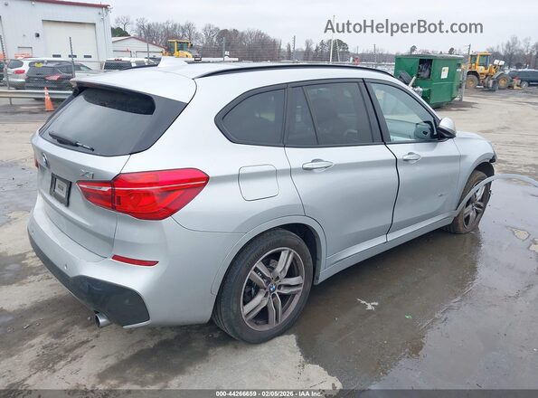WBXHT3C31G5E51359 2016 BMW X1 Серебряный Задняя правая четверть