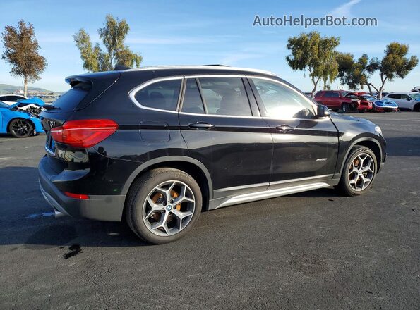 WBXHT3C33H5F73660 2017 BMW X1 Black Tył prawy
