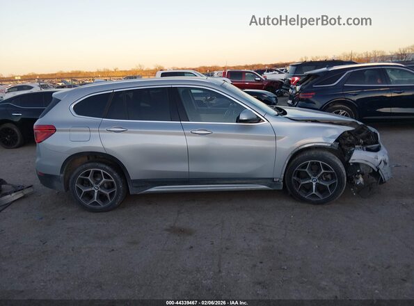 WBXHT3C34J5L34105 2018 BMW X1 Silver Вид задньої частини салону