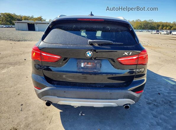 WBXHT3C37H5F87044 2017 BMW X1 Black Widok wnętrza z przodu
