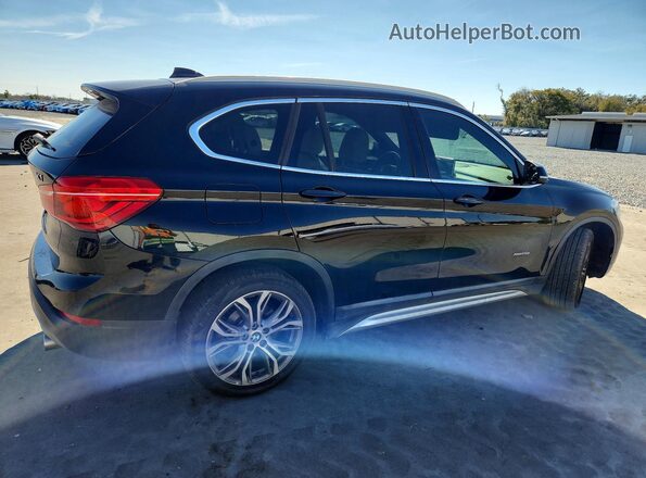 WBXHT3C37H5F87044 2017 BMW X1 Black Przód prawy