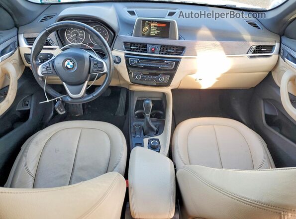 WBXHT3C39H5F70651 2017 BMW X1 White Вид панелі приладів