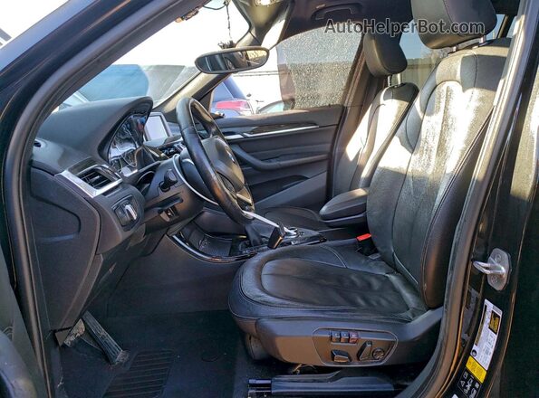 WBXHT3Z33G4A50294 2016 BMW X1 Черный Вид салона спереди