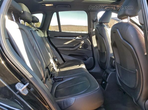 WBXHT3Z33G4A50294 2016 BMW X1 Черный Вид задней части салона