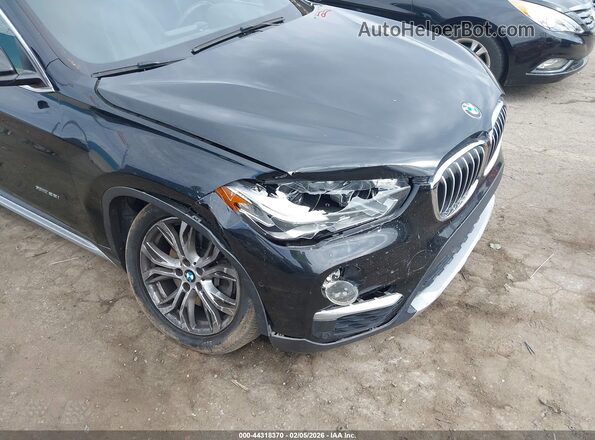 WBXHT3Z34G4A49252 2016 BMW X1 Черный Вид спереди