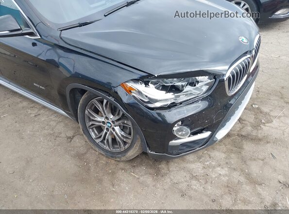 WBXHT3Z34G4A49252 2016 BMW X1 Черный 