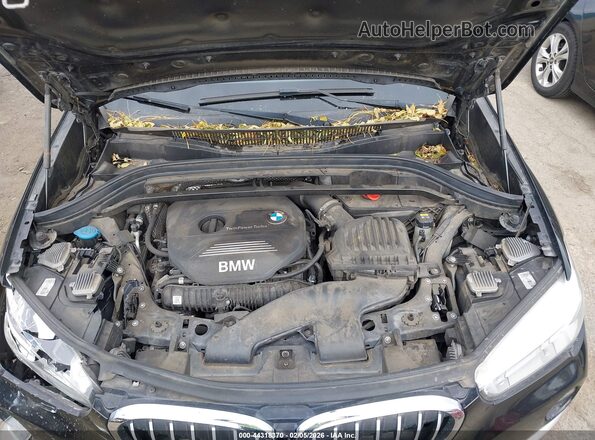 WBXHT3Z34G4A49252 2016 BMW X1 Черный Вид сзади