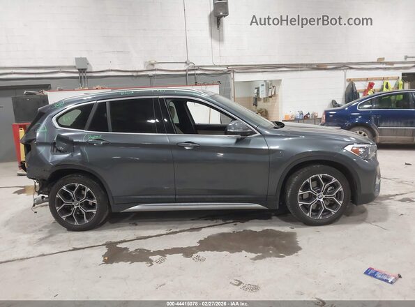 WBXJG9C07N5U58616 2022 BMW X1 Gray Vista interior trasera