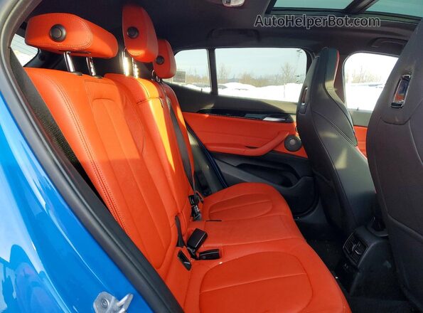 WBXYN1C09M5S67672 2021 BMW X2 Синий Вид задней части салона