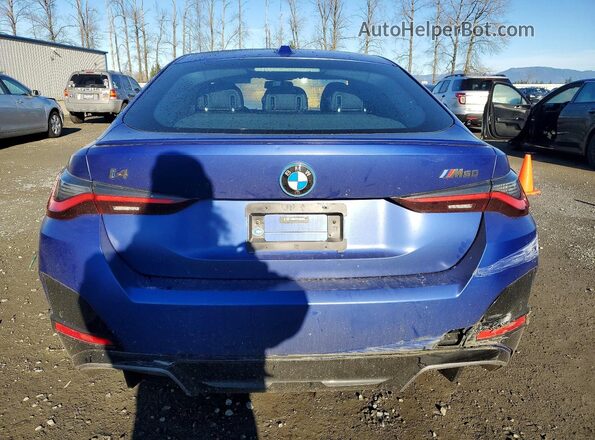 WBY33AW07NFM77108 2022 BMW I4 Синий Вид сзади