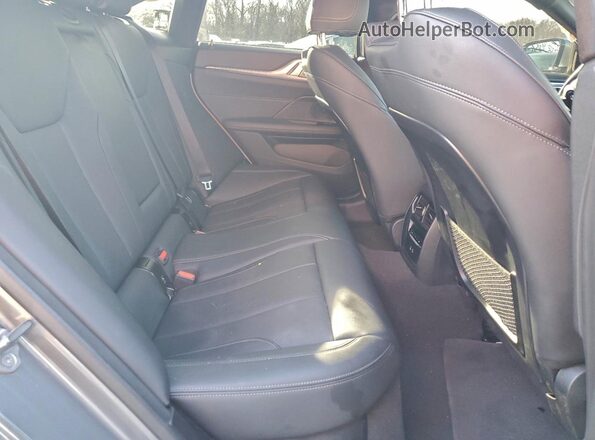 WBY43AW07RFS38975 2024 BMW I4 Gray Вид задніх сидінь