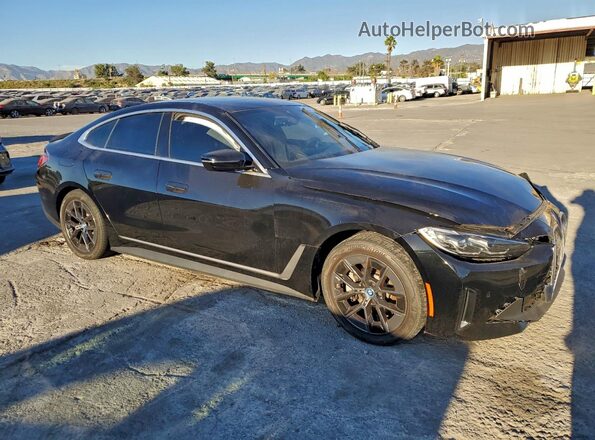 WBY43AW0XRFT38133 2024 BMW I4 Черный Передняя правая четверть