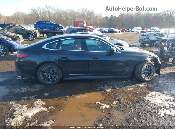 WBY43HD0XSFU44602 2025 BMW I4 Black Widok wnętrza z tyłu
