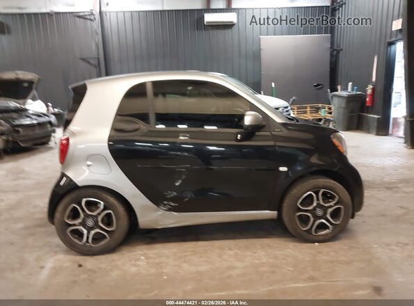 WMEFJ5DA7GK050031 2016 SMART FORTWO Черный Вид задней части салона