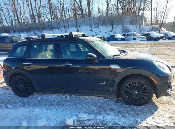 WMWLU5C56H2C46363 2017 MINI CLUBMAN Черный Вид задней части салона