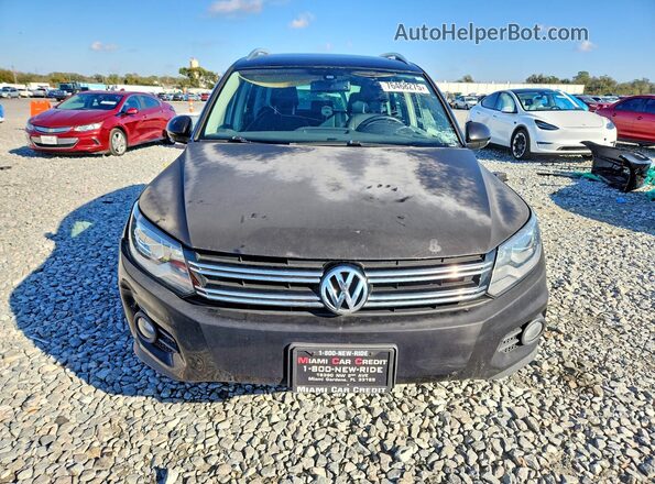 WVGAV7AX7GW597676 2016 VOLKSWAGEN TIGUAN Black Widok z przodu