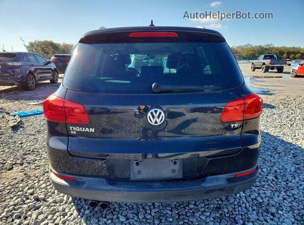 WVGAV7AX7GW597676 2016 VOLKSWAGEN TIGUAN Black Widok z tyłu