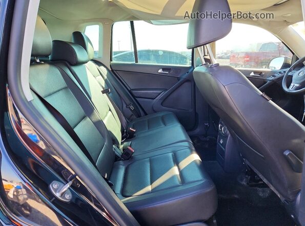 WVGAV7AX7GW597676 2016 VOLKSWAGEN TIGUAN Black Widok wnętrza z tyłu