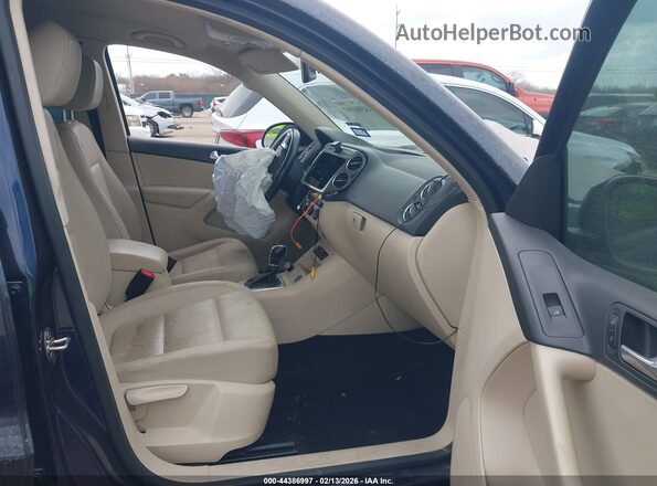 WVGBV7AX2GW554223 2016 VOLKSWAGEN TIGUAN Синий Вид салона спереди