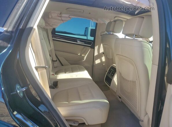 WVGEF9BP4GD002142 2016 VOLKSWAGEN TOUAREG Черный Вид задней части салона