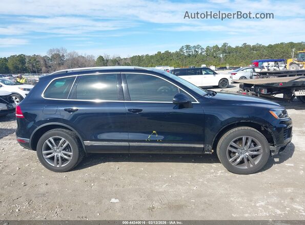 WVGEF9BP5GD011156 2016 VOLKSWAGEN TOUAREG Черный Вид задней части салона