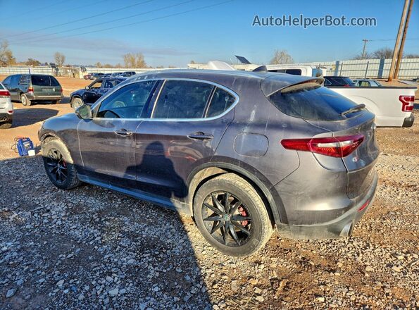 ZASFAKBNXJ7B62813 2018 ALFA ROMEO STELVIO Gray Trasero izquierdo