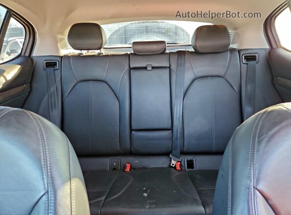 ZASFAKBNXJ7B62813 2018 ALFA ROMEO STELVIO Gray Vista de los asientos traseros