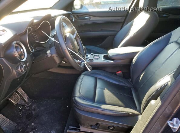 ZASPAKBN7P7D58267 2023 ALFA ROMEO STELVIO Gray Front interior view