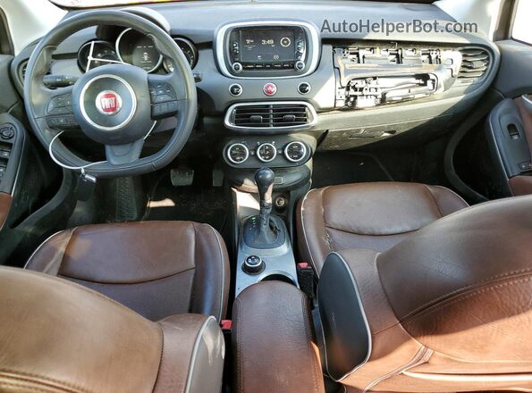 ZFBCFXCB1HP525155 2017 FIAT 500X Коричневый Вид панели приборов