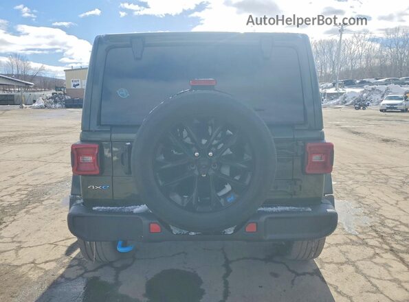 1C4JJXP68PW627427 2023 JEEP WRANGLER Зеленый Вид салона спереди