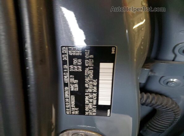 7JRL12FK0RG320231 2024 VOLVO S60 Gray Widok naklejki z numerem VIN
