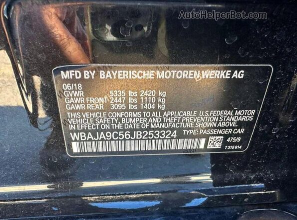 WBAJA9C56JB253324 2018 BMW 5 SERIES Черный Вид задней части салона