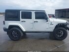 2016 Jeep Wrangler Unlimited Freedom Белый vin: 1C4BJWDG9GL167806