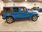 2016 Jeep Wrangler Unlimited Sahara Blue vin: 1C4HJWEG0GL108331