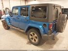 2016 Jeep Wrangler Unlimited Sahara Blue vin: 1C4HJWEG0GL108331