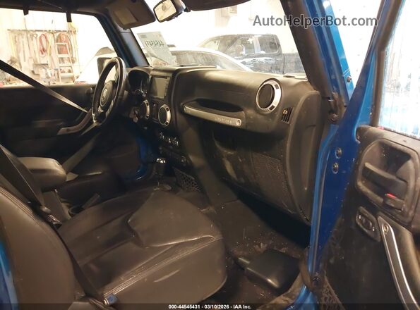 1C4HJWEG0GL108331 2016 JEEP WRANGLER UNLIMITED Blue Widok wnętrza z przodu