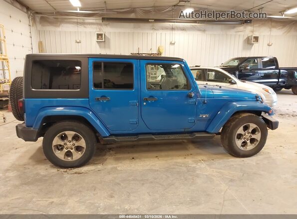 1C4HJWEG0GL108331 2016 JEEP WRANGLER UNLIMITED Blue Widok wnętrza z tyłu