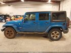 2016 Jeep Wrangler Unlimited Sahara Blue vin: 1C4HJWEG0GL108331