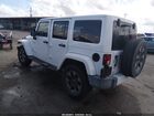 2016 Jeep Wrangler Unlimited Sahara White vin: 1C4HJWEG9GL216883