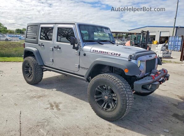 1C4HJWFG2GL122648 2016 JEEP WRANGLER Серый Передняя правая четверть