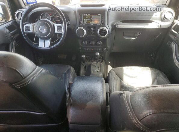 1C4HJWFG2GL145461 2016 JEEP WRANGLER Черный Вид панели приборов