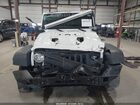 2016 Jeep Wrangler Unlimited Rubicon Hard Rock White vin: 1C4HJWFG5GL100711