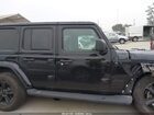 2023 Jeep Wrangler 4-door Sahara Altitude 4x4 Черный vin: 1C4HJXEG7PW577694