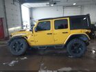 2019 Jeep Wrangler Unlimited Rubicon 4x4 Желтый vin: 1C4HJXFG2KW611192