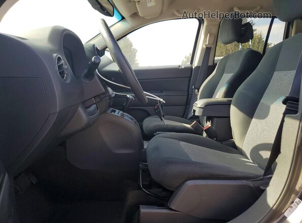 1C4NJDBB6GD657297 2016 JEEP COMPASS Gray Widok wnętrza z przodu
