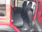 2024 Jeep Wrangler 4-door Willys 4x4 Red vin: 1C4PJXDG8RW315344
